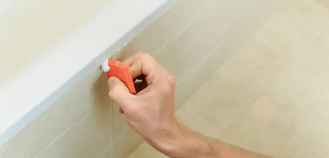 bathroom tiles smoothing silicone sealant by aapkapainter