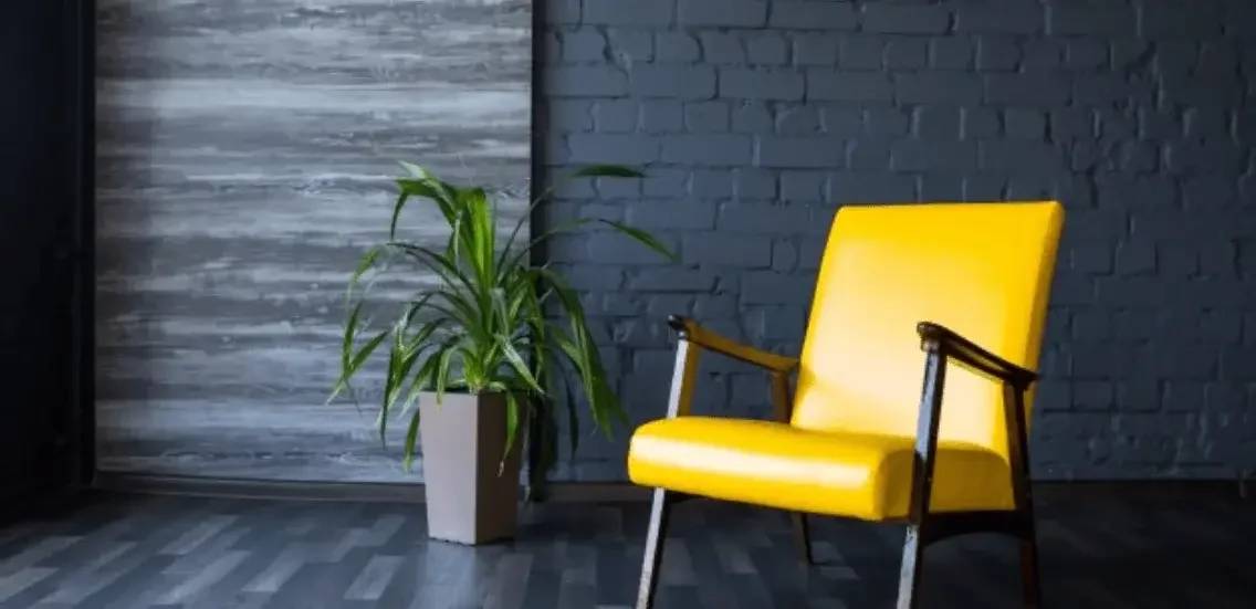 stylish retro yellow chair gray room brick gray wall color design ideas