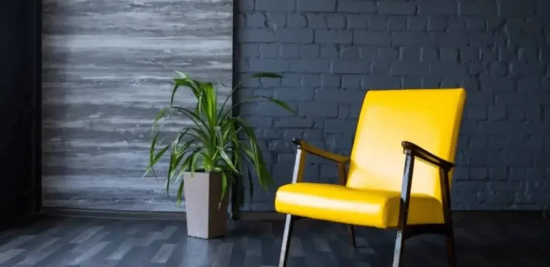 stylish retro yellow chair gray room brick gray wall color design ideas